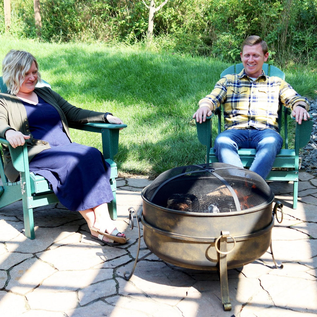 Sunnydaze Outdoor Camping or Backyard Round Cauldron Fire Pit with Spark Screen, Log Poker, and Metal Wood Grate